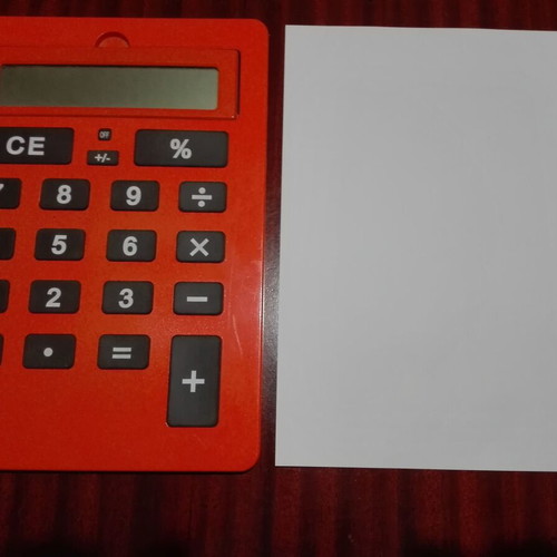 Giant calculator used, orange, A4 size