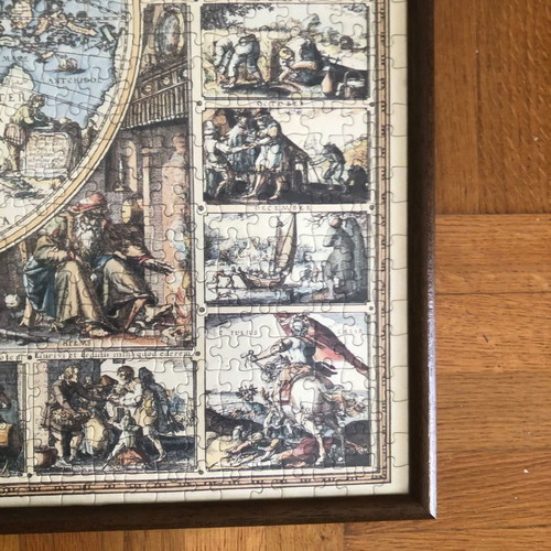World puzzle with frame used, brown color and glass