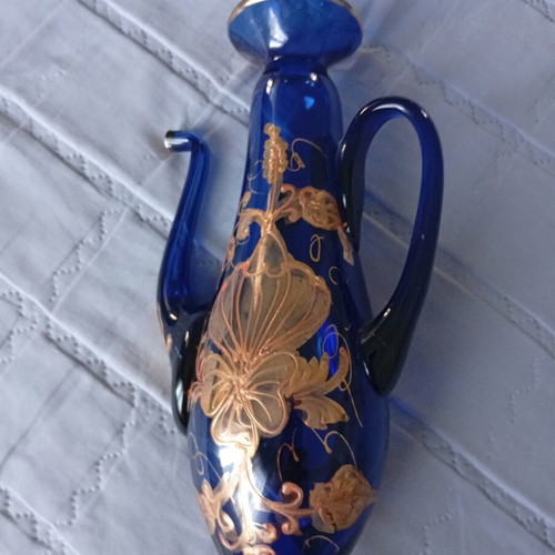 Vintage cobalt blue decorative vase with gold floral motifs