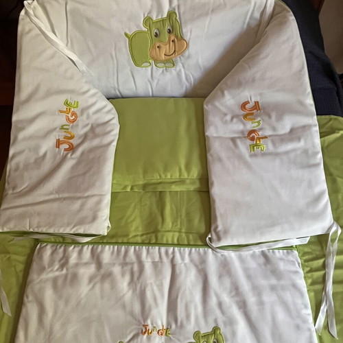 Crib bedding set 3 pieces with green hippopotamus motif, like new