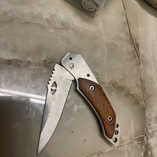 Folding Pocket Knife used, stainless steel blade with wooden handle