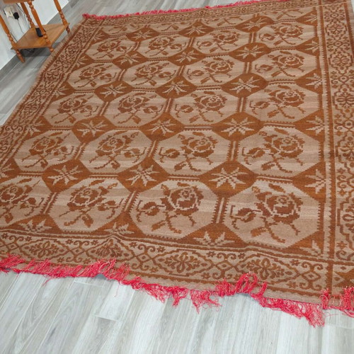 Handmade wool rug woven on traditional loom, new