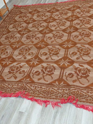 Handmade wool rug woven on traditional loom, new