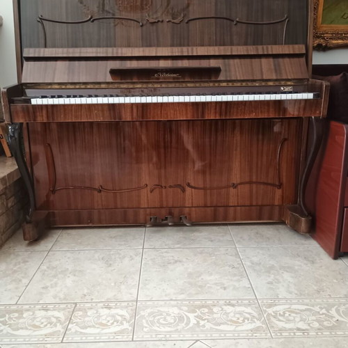 Noctuino upright piano like new, walnut wood finish