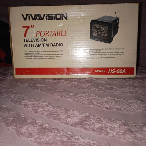 Vintage portable black and white television with radio like new