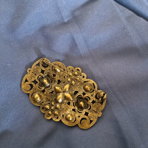 Vintage brooch used with filigree design and gold finish