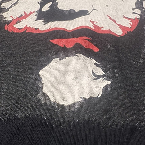Men's black t-shirt with Joker print, rounded hem