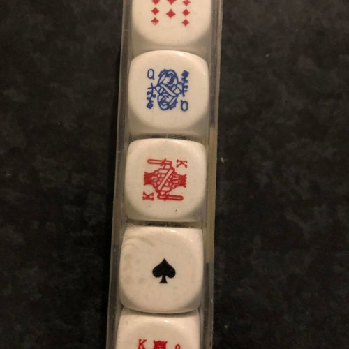 Dice set with playing card symbols used, with box
