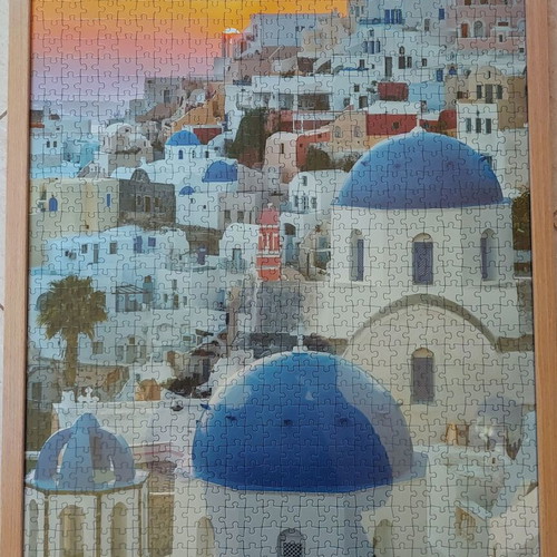 Framed puzzle like new, dimensions 0.53x0.73 m