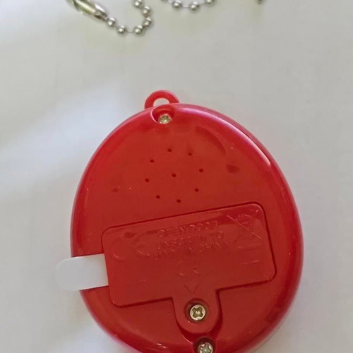 Retro digital virtual pet with chain, like new