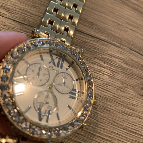 Golden wristwatch, women's