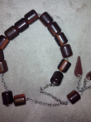 Worry beads with cylindrical plastic beads used