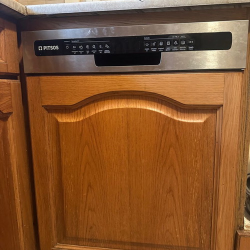 Pitsos built-in dishwasher with wooden kitchen front, model DIF61100