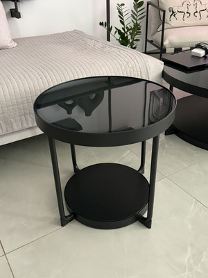 Coffee table used with metal base and black glass top