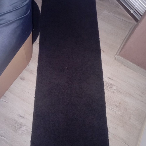 Black interior vintage runner rug used, minimalist design