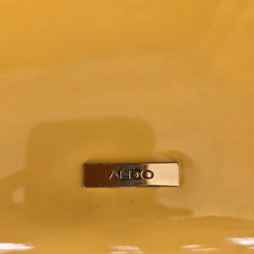 Aldo yellow vinyl clutch bag used with gold trim