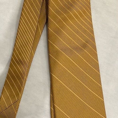Lanvin tie like new, gold color