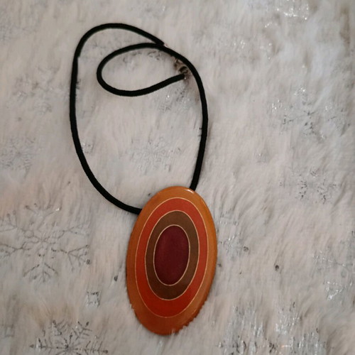 Boho necklace like new with leather tie orange