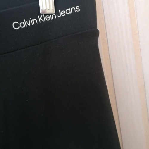 Calvin Klein jeans pants size M new, black with front slit