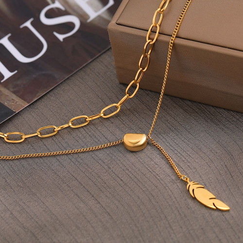 Feather necklace in gold color new stainless steel