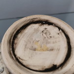 Faience cachepot used with embossed cherub design