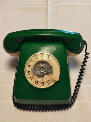 Old green wired telephone, functional