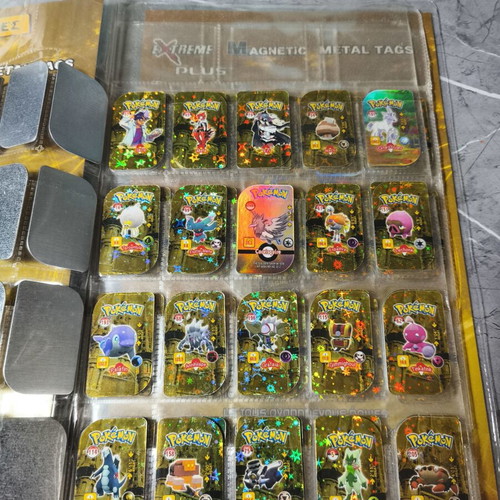 Pokemon metal tags used from collection pack