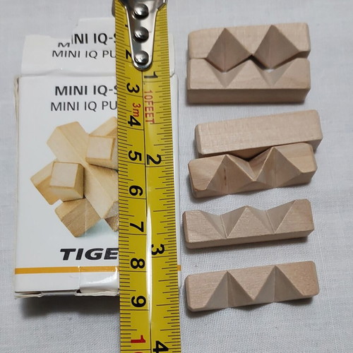 3D Wooden Burr Puzzle like new, compact brain teaser