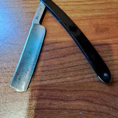 Solingen antique razor used, bakelite and steel blade