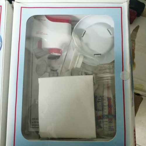 NUK breast pump like new with power cable and adapter