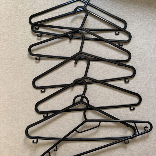 Set of 7 black hangers like new