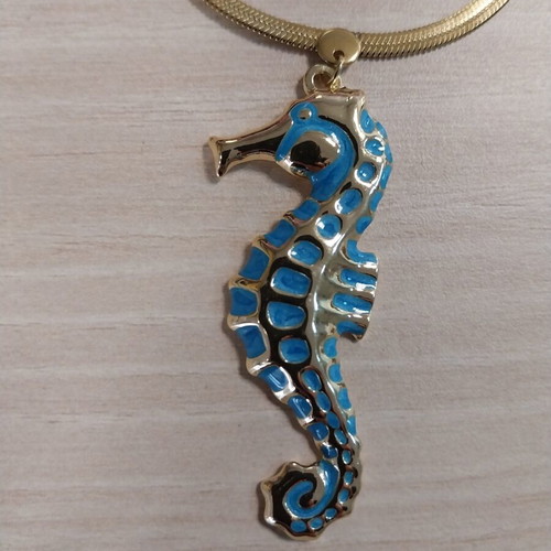 Summer necklace gold steel with embossed blue seahorse like new
