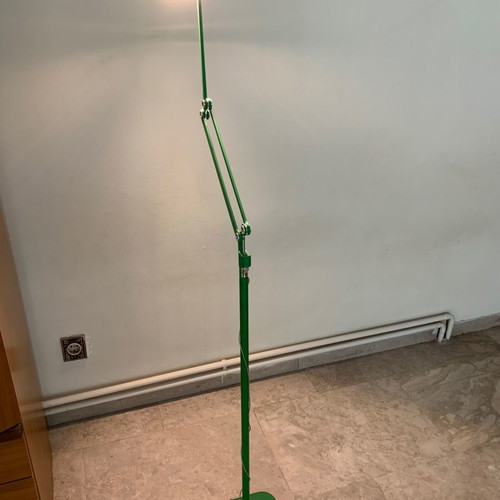 Modern floor lamp used with rotating arm and LED lighting