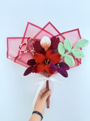 Handmade aromatic bouquet in red shades with waterproof wrapping