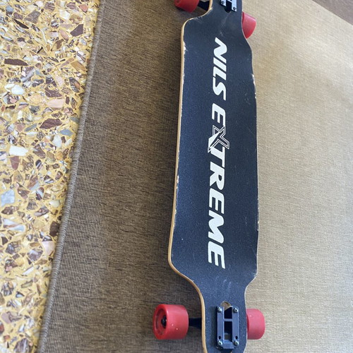 Nils Longboard like new with minor edge wear