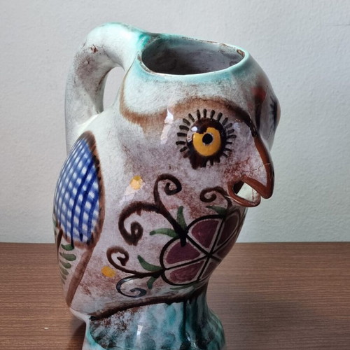 Ceramic owl pitcher used, broken and glued on the beak