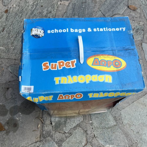 Vintage Paxos TV with bag and school supplies