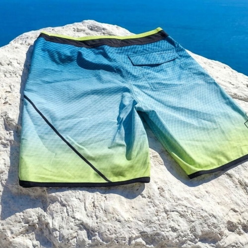 Quiksilver Bermuda shorts like new, turquoise, size 12-14 years