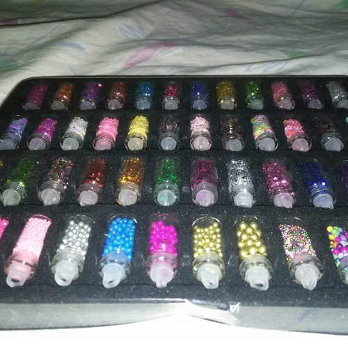 Set of 48 Glitter and Nail Art Flakes in Glass Bottles with Metal Case