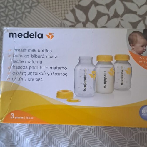 Electric breast pump with 3 storage bottles, like new