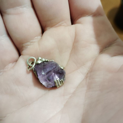Silver pendant handmade with amethyst and liquid glass