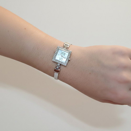 Haurex women's watch like new, white with leather strap and rhinestones