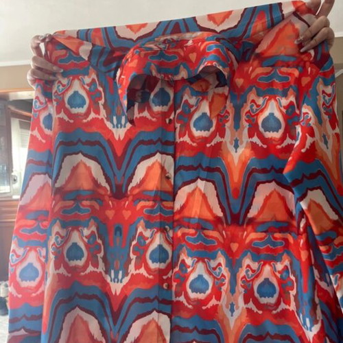 Women's shirt like new with blue, orange and white details, size large - extra large