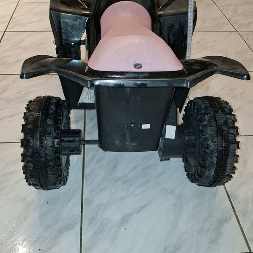 Children's electric ATV like new, black with pink details