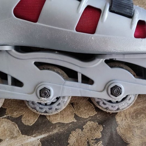 Rollers used silver with red knee pads, size 37