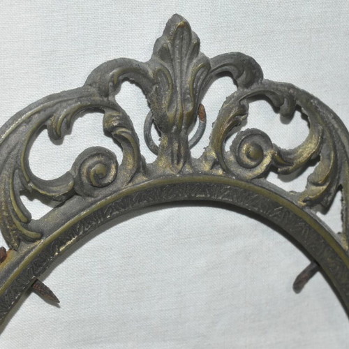 Brass oval frame used with embossed vintage design