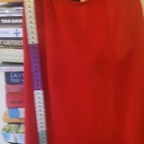Red sleeveless flowing top used, size S, semi transparent material