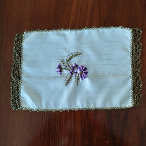 Embroideries used, two small doilies with gold thread and lace