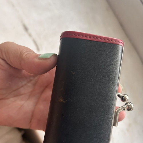David Jones leather coin purse used, black and burgundy with kiss-lock closure