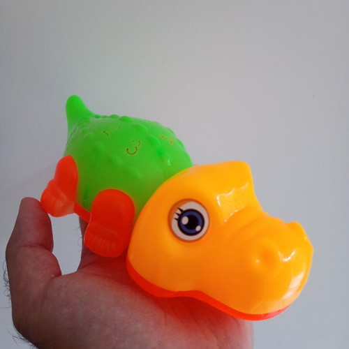 Mechanical crocodile toy used with light